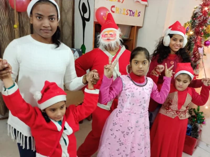 Children celebrating Christmas Day at HCRA