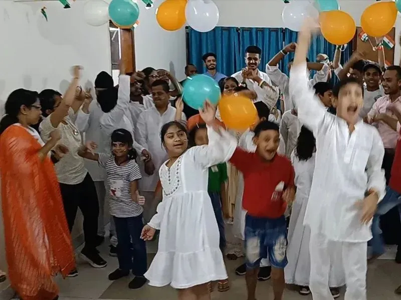 Children celebrating a national holiday with balloons