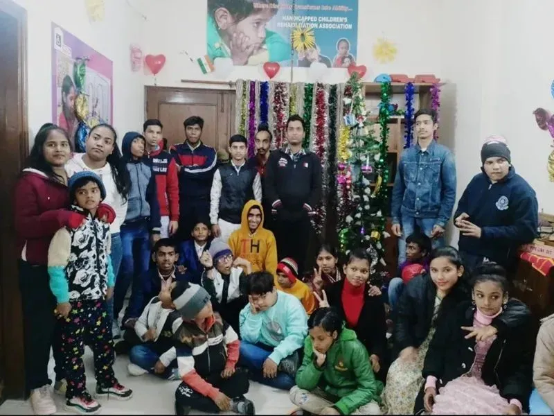 HCRA staff and children at a Christmas Day gathering